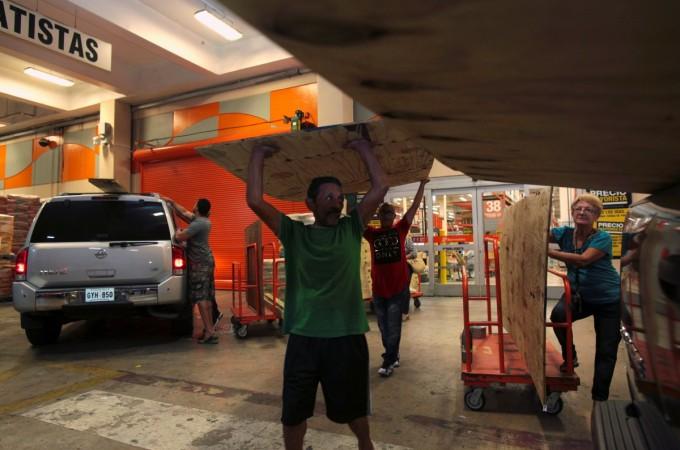 People buy materials at a hardware store after Puerto Rico Governor Ricardo Rossello declared a state of emergency in preparation for Hurricane Irma Hurricane Irma