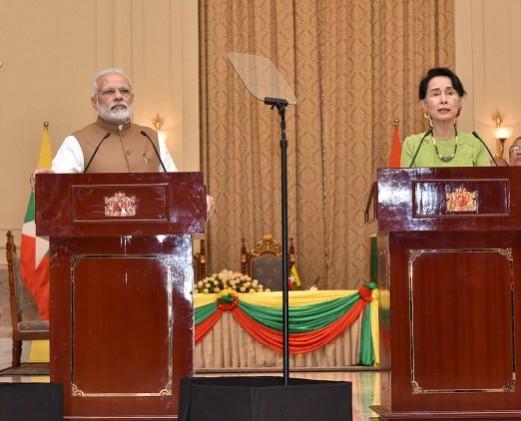 PM Narendra Modi with State Councillor Ms. Aung San Suu Kyi at the joint media briefing at Presidential Palace in Naypyidaw, Myanmar. Narendra Modi in Myanmar