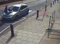 Driver runs down pedestrian and reverses away