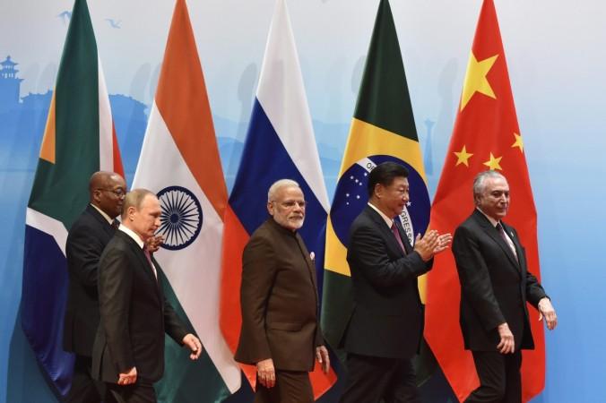 Brazilian President Michel Temer, Chinese President Xi Jinping, Indian Prime Minister Narendra Modi, Russian President Vladimir Putin, and South Africa's President Jacob Zuma attend the BRICS Business Council and Signing ceremony at the BRICS Summit in Xiamen on September 4, 2017. BRICS Summit