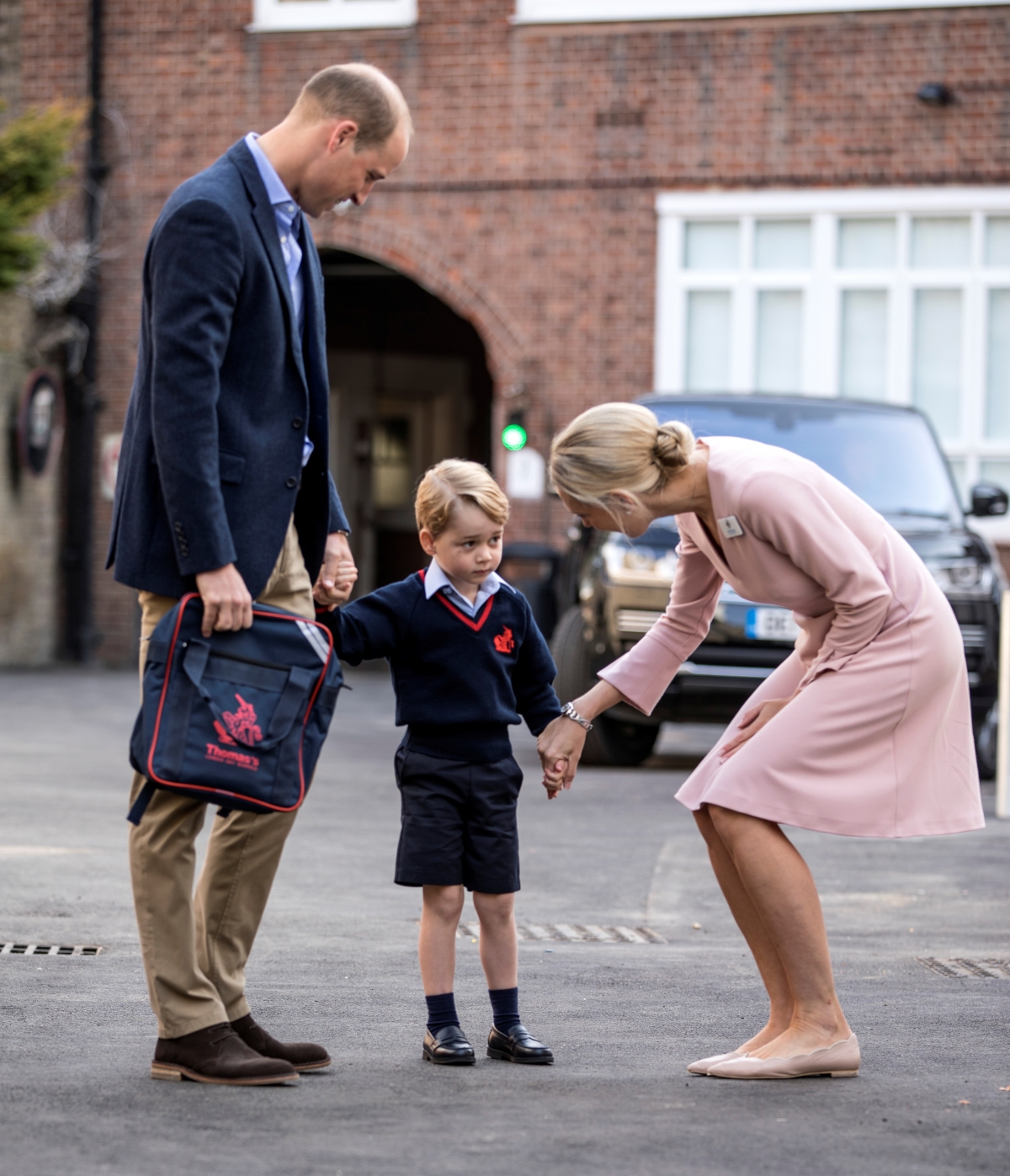Britain's Prince William and his son Prince George on his first day of school at Thomas's school in Battersea, London