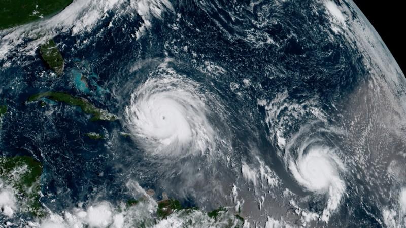 Hurricane Irma (L) and Hurricane Jose are pictured in the Atlantic Ocean in this September 7, 2017 NOAA satellite handout photo Irma and Jose