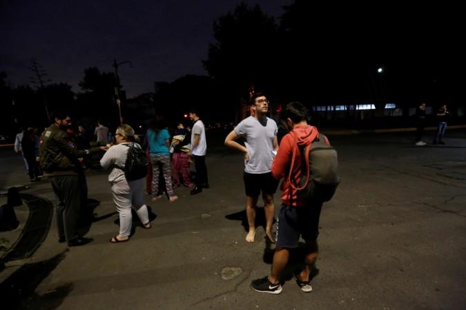 People gather on a street after an earthquake hit Mexico City, Mexico late September 7, 2017. Mexico earthquake
