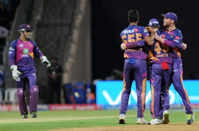 File photo of MS Dhoni (L) with his RPS teammates Washington Sundar