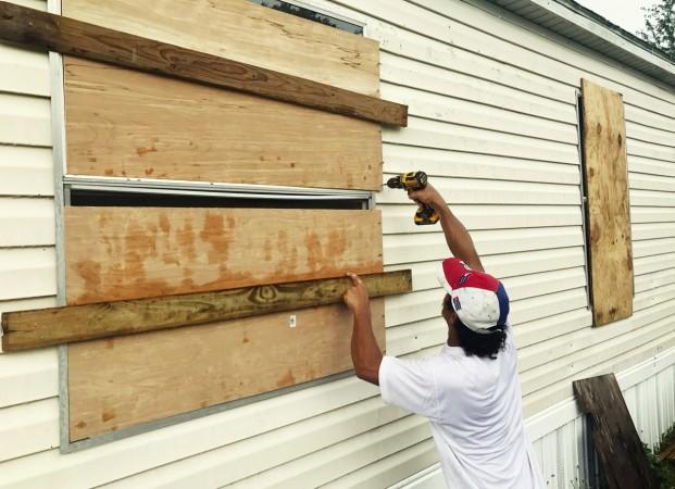 Filomeno Romero, 52, reinforces his mobile home ahead of the approach of Hurricane Irma in Apopka, Florida Florida