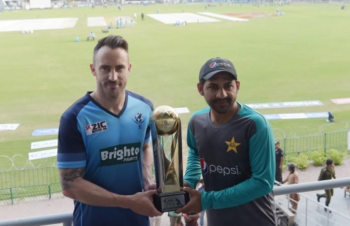 Faf du Plessis and Sarfraz Ahmed pose with the Independence Cup on Monday Pakistan vs World XI