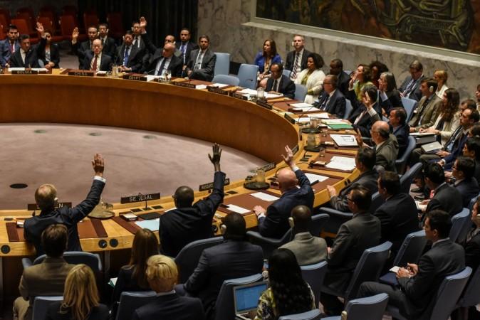 Ambassadors to the UN vote during a United Nations Security Council meeting on North Korea in New York City UNSC