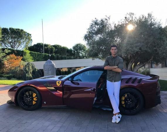 Cristiano Ronaldo with his Ferrari F12tdf Cristiano Ronaldo with his Ferrari F12tdf