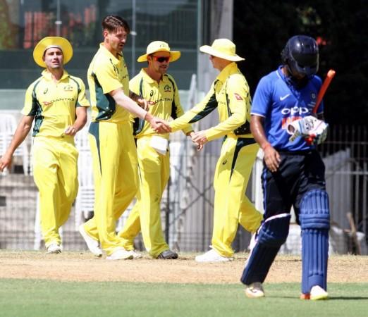 Australian cricketers celebrate fall of a wicket during a warm-up match between India Board President's XI and Australia at MA Chidambaram Stadium in Chennai on Sept 12, 2017 australia, india cricket