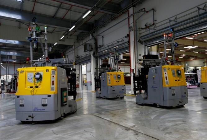 Automated forklifts are pictured in the new Evian water bottling plant Automation
