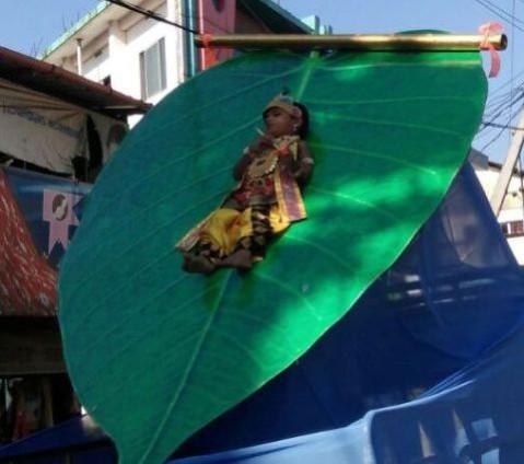 Child tied to peepal leaf
