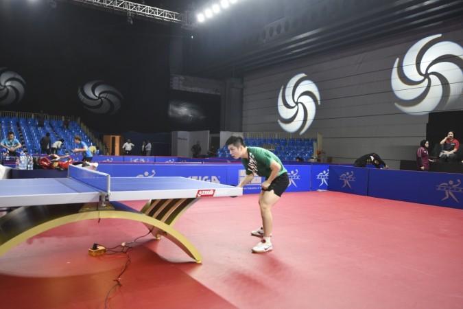 Chinese top seed Fan Zhendong practises at TransStadia. Table Tennis