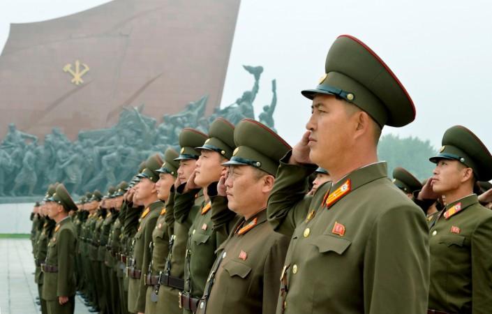 North Korean soldiers salute at Mansudae hill in Pyongyang, North Korea, in this photo taken by Kyodo, September 9, 2017 on the 69th founding anniversary of the country. North Korean soldiers