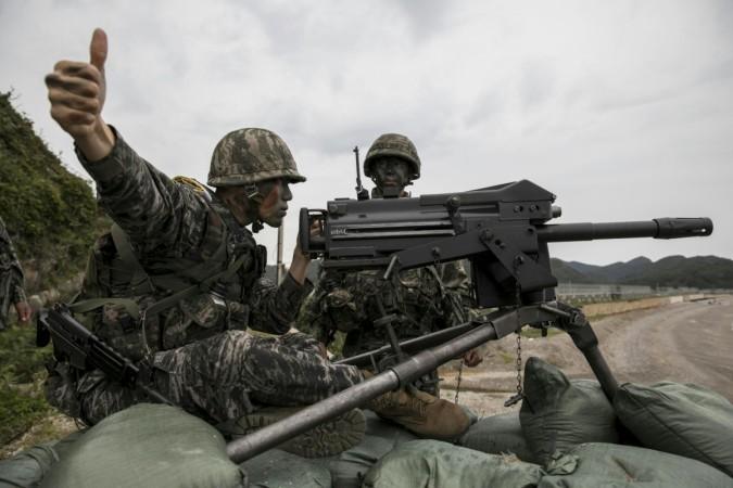 South Korean marines take part in a military exercise on South Korea's Baengnyeong Island, near the disputed sea border with the north, in this handout picture provided by South Korean Marine Corps and released by Yonhap, September 7, 2017. South Korean marines