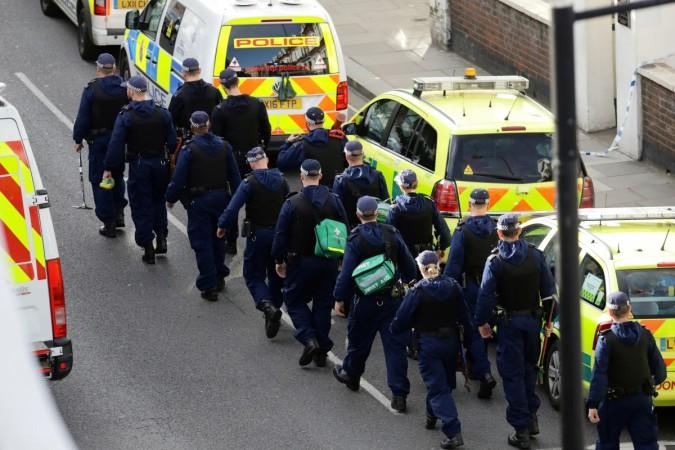 Police officers walk on the road near Parsons Green tube station in London, Britain September 15, 2017. London train blast