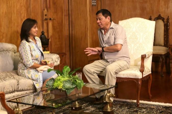 Vice Presdident Leni Robredo (left) with Rodrigo Duterte (right) Vice Presdident Leni Robredo
