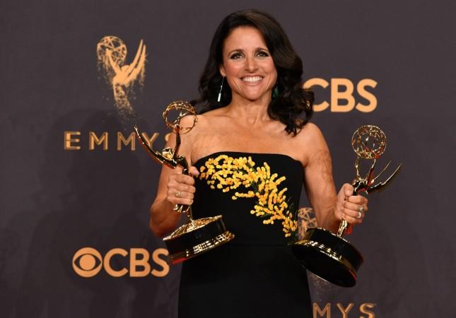Julia Louis-Dreyfus posing with her Emmy Award 69th Emmy Awards