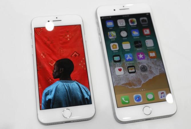 An iPhone 8 (L) and an iPhone 8 Plus are displayed during a launch event in Cupertino, California, U.S. September 12, 2017. iPhone 8