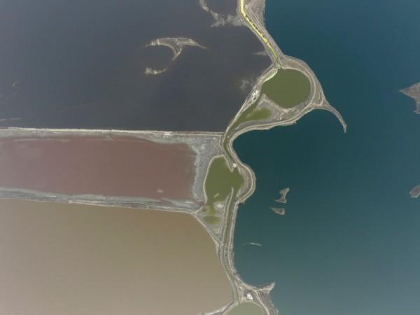 A salt lake displays different colours caused by a reaction by algae within the various pools in Yuncheng, Shanxi Province, China, March 20, 2017. Dead Sea in China