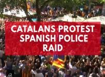 Thousands protest after Spanish police raid Catalan ministry ahead of banned independence vote