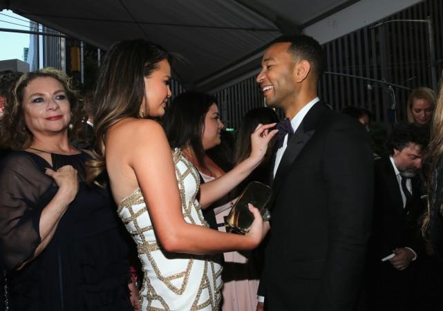 Chrissy Teigen and John Legend share a moment at the 2017 Tony Awards. chrissy and john