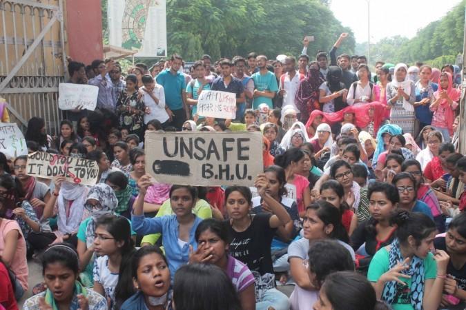 Students of Banaras Hindu University (BHU) stage a protest against the molestation of a student inside the campus in Varanasi on Sept 23, 2017 BHU