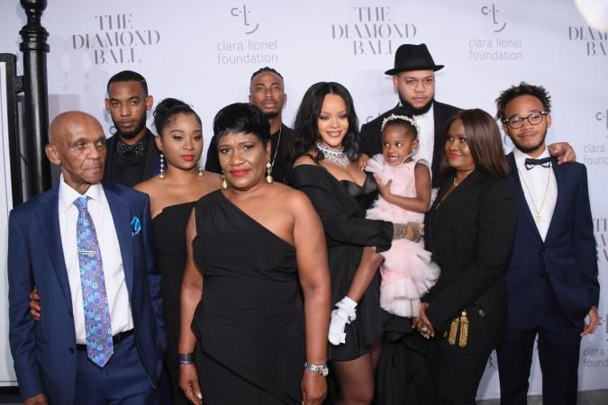 Rihanna with guests at the Diamond Ball. diamond ball