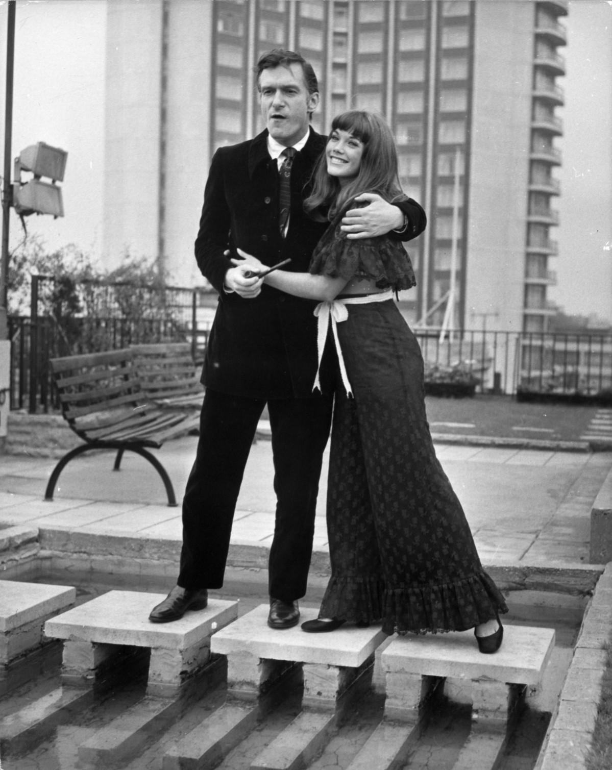 American pornographic magazine publisher and club owner, Hugh Hefner with American actress, Barbara Benton on the roof of London's Playboy Club on Park Lane, Central London after holding a press conference. Hugh Hefner
