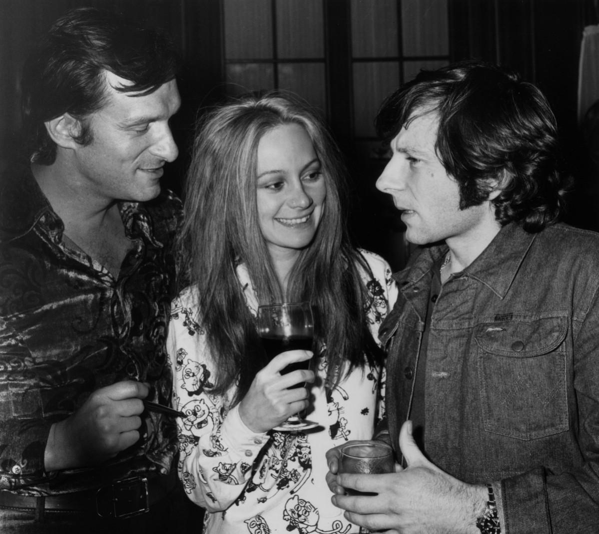 Roman Polanski talking to Hugh Hefner, owner of the Playboy empire, who has sponsored his latest film 'Macbeth' which stars Francesca Annis (centre). Hugh Hefner