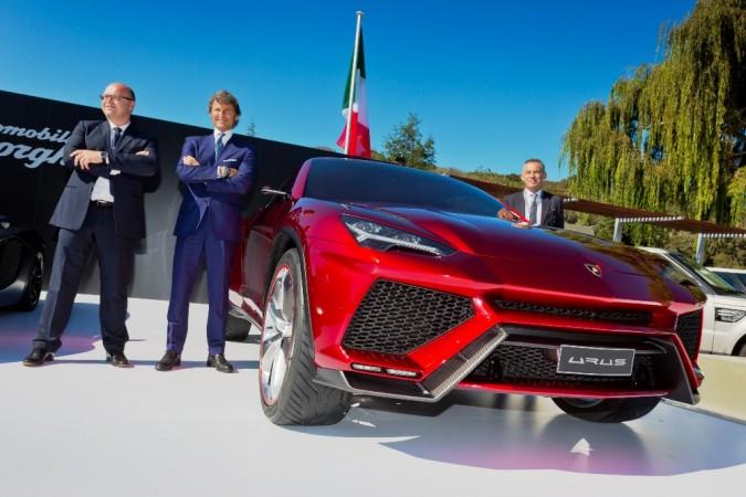 Filippo Perini, Stephan Winkelmann and Maurizio Reggiani next to Lamborghini Urus at Monterey (CA), US. Lamborghini