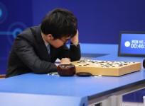 Chinese Go player Ke Jie reacts during his second match against Google's artificial intelligence program AlphaGo