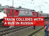 At least 16 killed as bus torn apart by speeding train in Russia