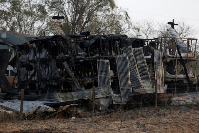 Burnt structures are seen along Highway 121 during the Nuns Fire in Sonoma. California