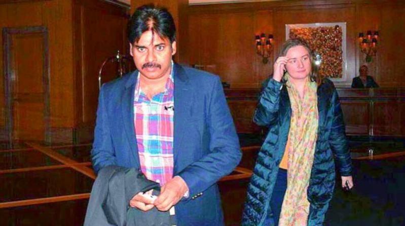 Pawan Kalyan with his third wife Anna Lezhneva at Boston airport in the US Pawan Kalyan's third wife Anna Lezhneva