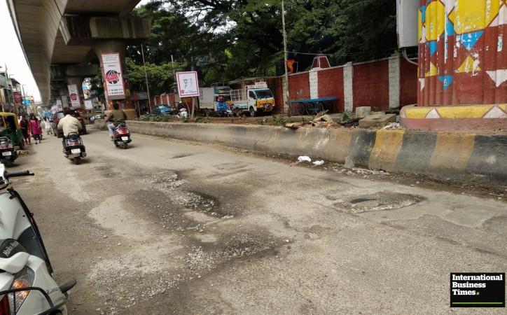 Potholes in Indiranagar CMH Road Potholes, Bangalore potholes
