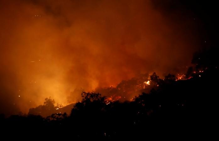 In picture: The Pocket wildfire burns in the hills above Geyserville, California, US, October 13, 2017. California wildfires