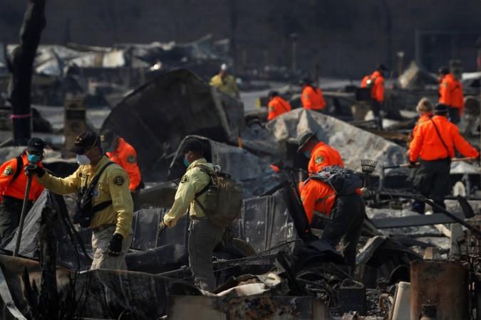 In picture: Search and Rescue teams search for two missing people amongst ruins at Journey's End Mobile Home Park destroyed by the Tubbs Fire in Santa Rosa, California, US, October 13, 2017. California wildfires