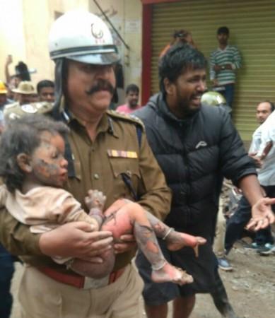 In picture: The three-year-old girl who was rescued from the debris of a house that collapsed in the Ejipura area of Bengaluru on Monday, October 13, 2017. Bengaluru building collapse
