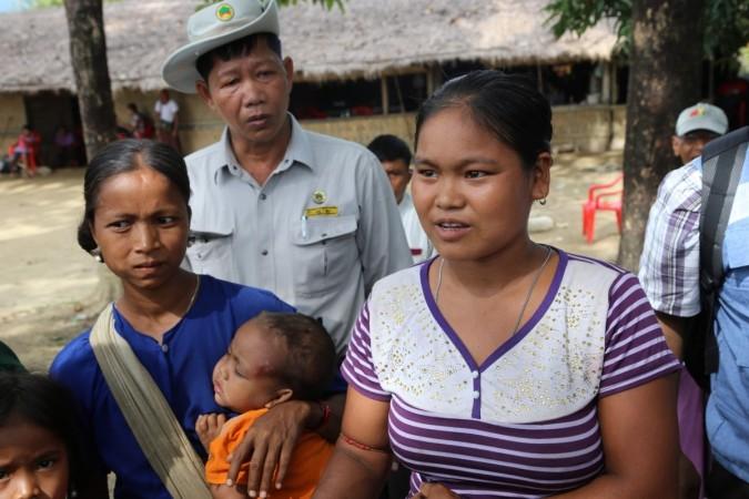 In picture: A villager tells about her suffering in Ah Nauk Pyin Village, Myanmar's northern Rakhine state, on October 2, 2017. Around 50 delegates from embassies, international organizations and media organizations in Myanmar paid a government-organized visit to northern Rakhine state on Monday. Rohingya