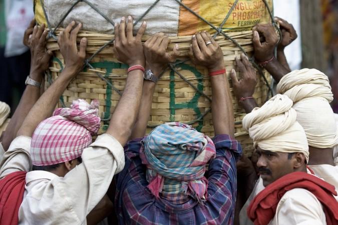 Daily wage earners, who belong to unorganised sector. daily wage earners