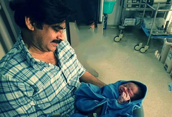 Pawan Kalyan holding his new born son Pawan Kalyan holding his new born son