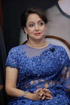 Hema Malini is all smiles at her biography Beyond the Dream Girl's launch event. Hema Malini