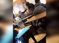 Students walk out of class after teacher tells them to speak American