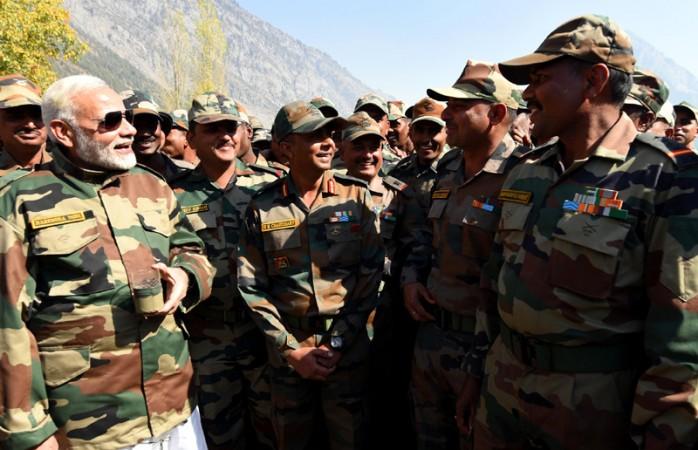 The Prime Minister, Shri Narendra Modi celebrating Diwali with the jawans of Indian Army and BSF, in the Gurez Valley, near the Line of Control, in Jammu and Kashmir, on October 19, 2017. Modi celebrates diwali in Gurez