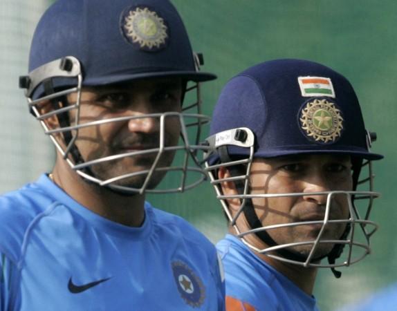 Sehwag (left) and Tendulkar during an Indian training session in 2009, in Hyderabad. Virender Sehwag