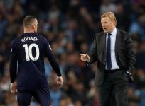 Wayne Rooney and Ronald Koeman