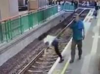 CCTV captures moment man pushes woman onto railway tracks in Hong Kong