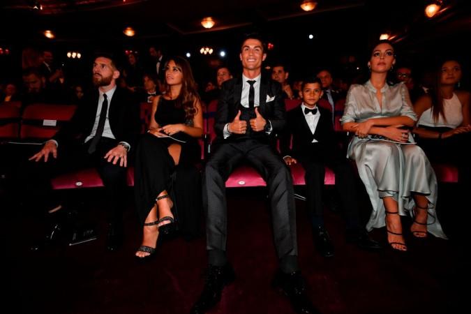 Lionel Messi and Cristiano Ronaldo with their respective partners. Lionel Messi, Cristiano Ronaldo