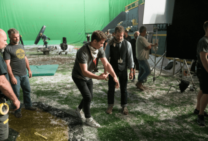 Justice League director Zack Snyder and his son Eli during the filming of the movie Justice League