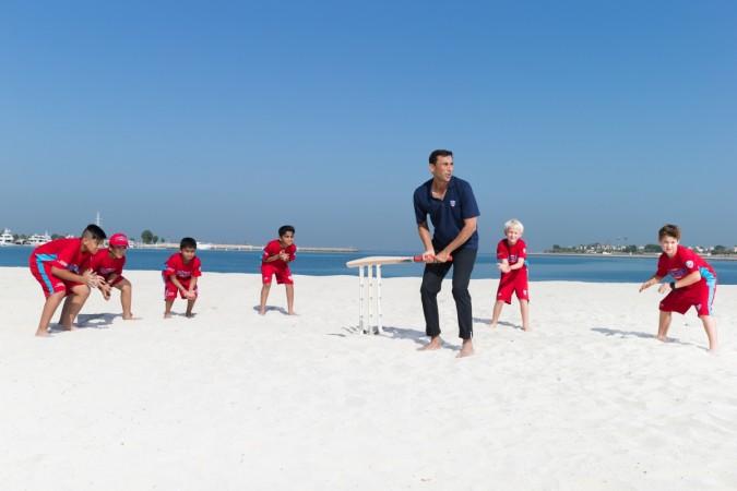 Younis Khan takes to the (sandy) crease as Zayed Cricket Academy students try and catch him out Younis Khan